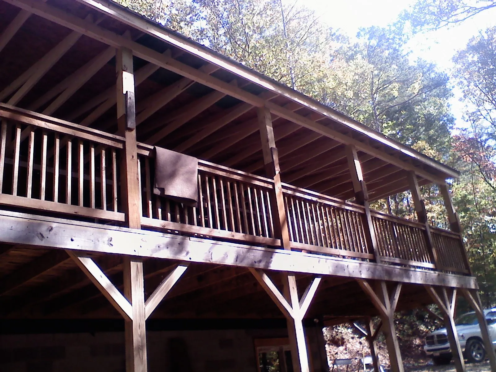 Timber framing under a new elevated porch and deck — Roof Leak Repair in Isanti by Roofing Brothers